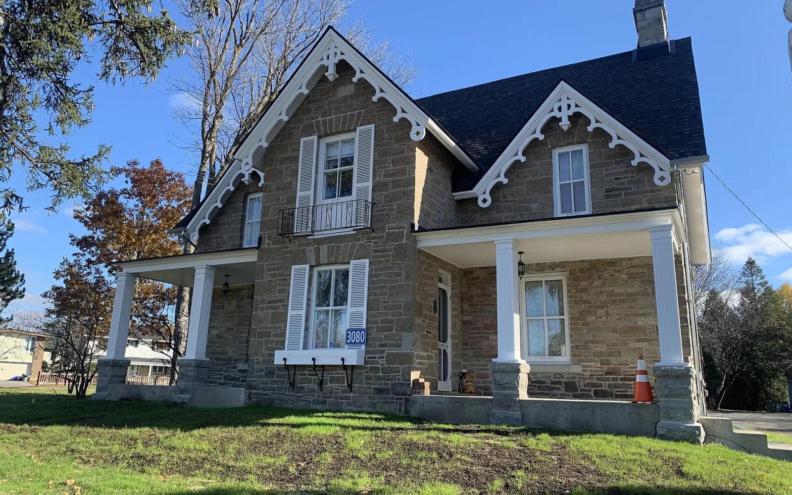 Fairfields Heritage House in Nepean under a clear autumn sky